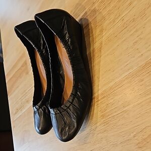 Lucky black leather wedges